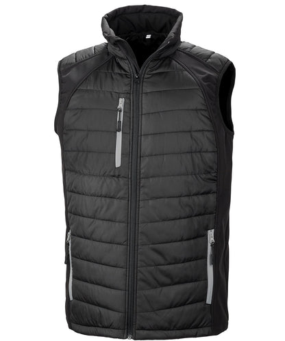 R238X Compass hybrid gilet in Black with Grey zippers showing the quilted padded core and flexible softshell side panels.