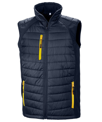 R238X Compass hybrid gilet in Navy with Yellow zippers showing the quilted padded core and flexible softshell side panels.