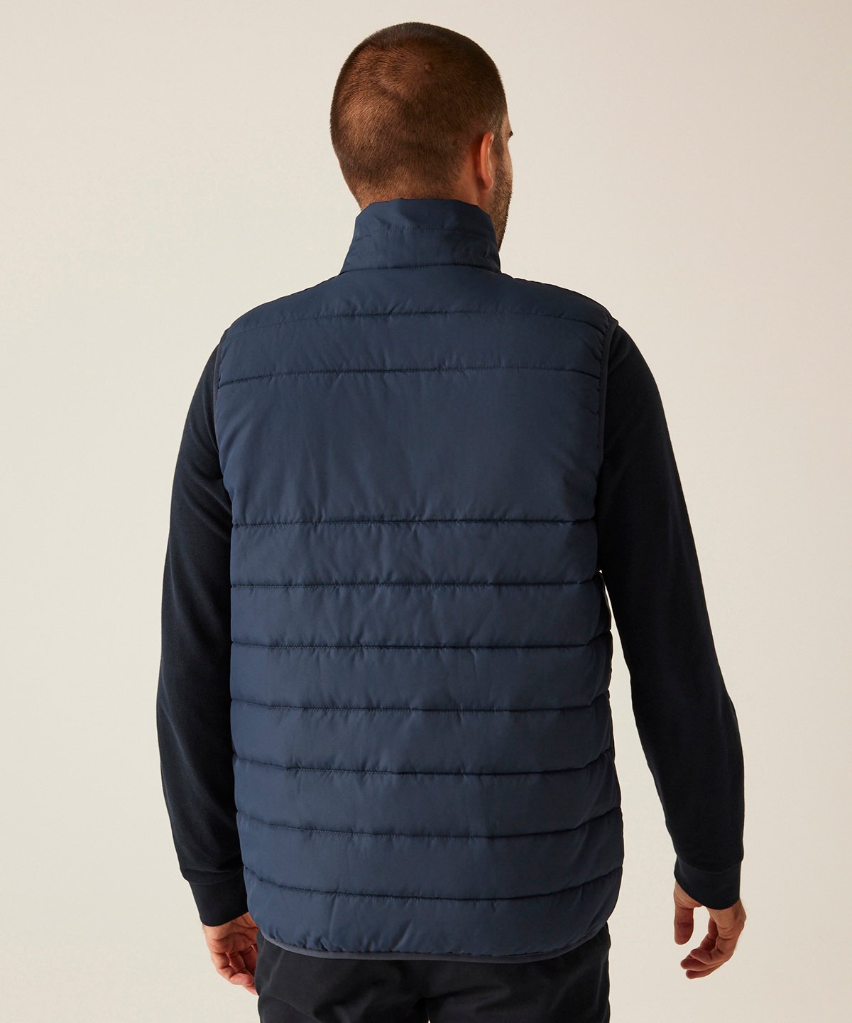 Back view of the the RG642 thermal gilet, showing the thick padding designed for maximum heat retention.